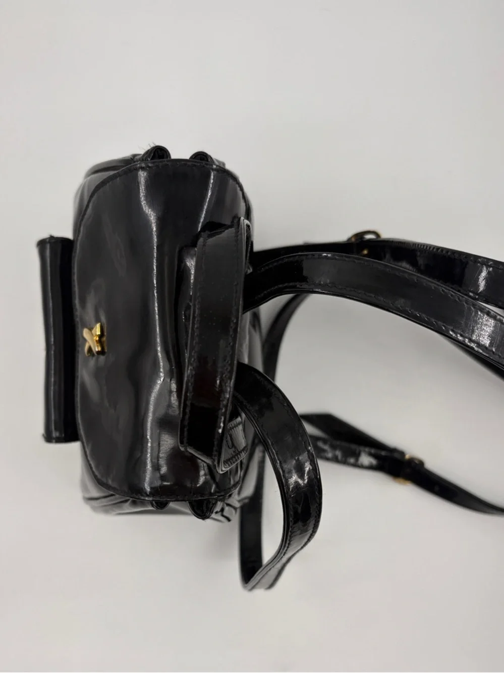 Paloma Picasso Black Patent Mini Backpack with Gold X Hardware